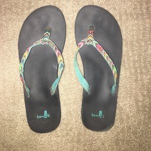Multicolor Sanuk flip flops