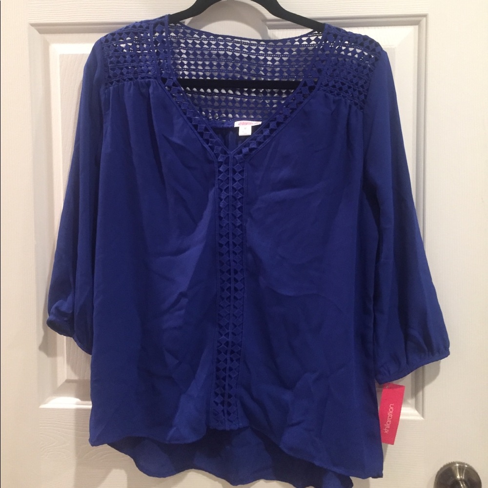 NWT bright blue top. Cute embellishments.