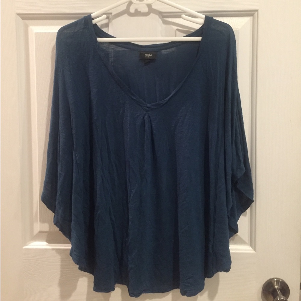 Flowy turquoise top.