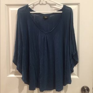 Flowy turquoise top.