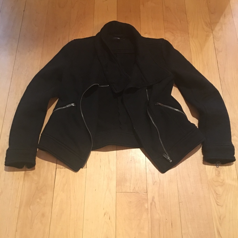 Black sudo-motorcycle jacket.