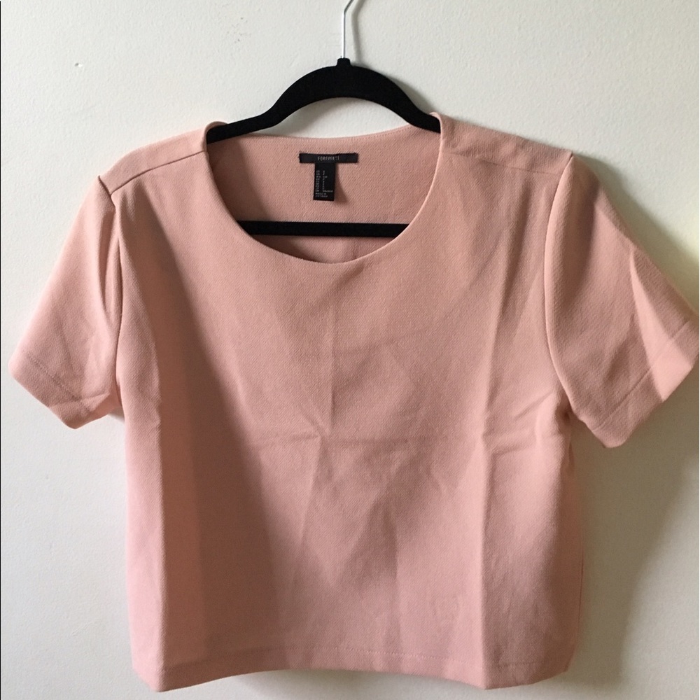 A pink crop top
