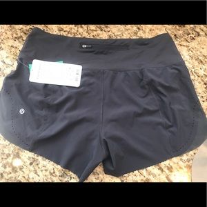 Lululemon NWT smooth stride short.   Size 10. Grey
