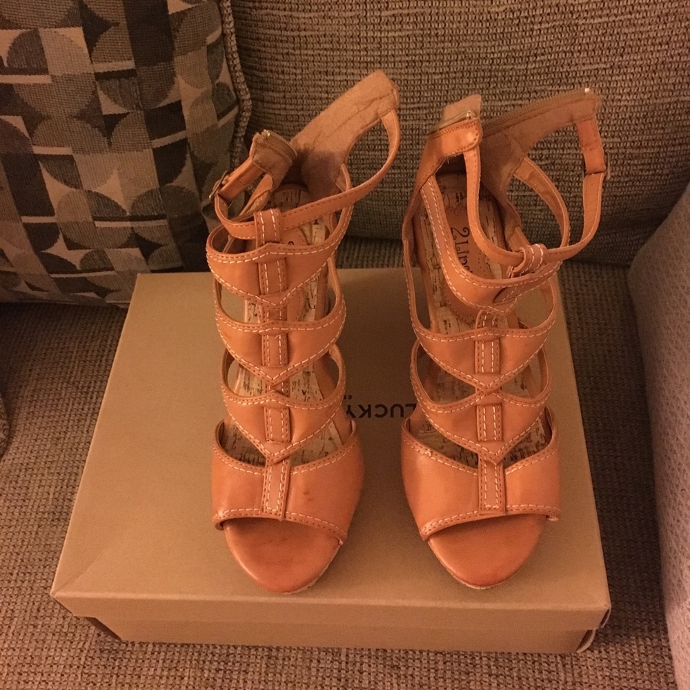 Pair of brown leather open-toe chunky heels