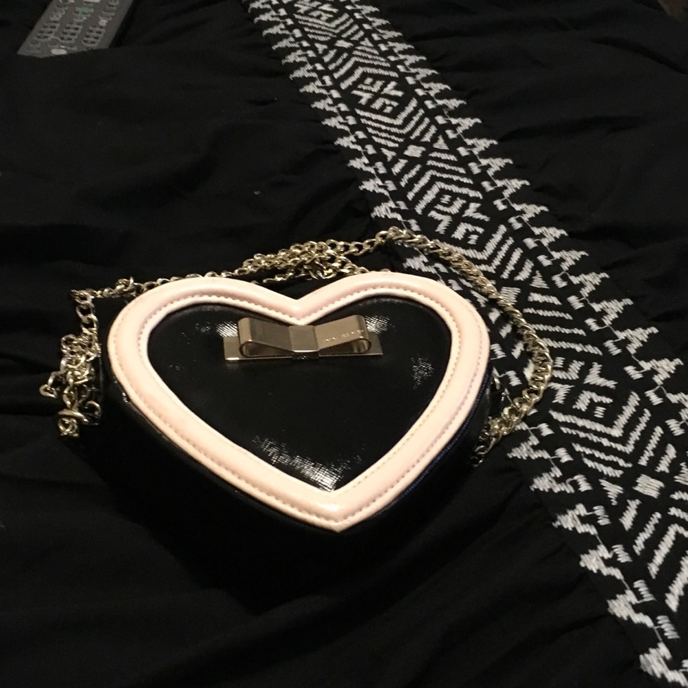 Pink and black purse