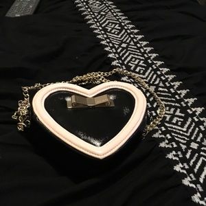 Pink and black purse