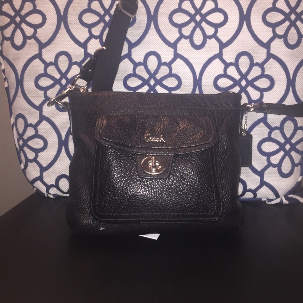 Black genuine leather COACH crossbody.