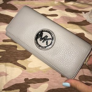 Used authentic gray Michael Kors wallet