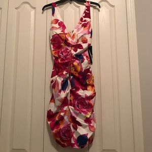 Satiny dress by Roulette. Still has tag on.