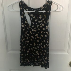 Wet Seal black tank top with a daisy print