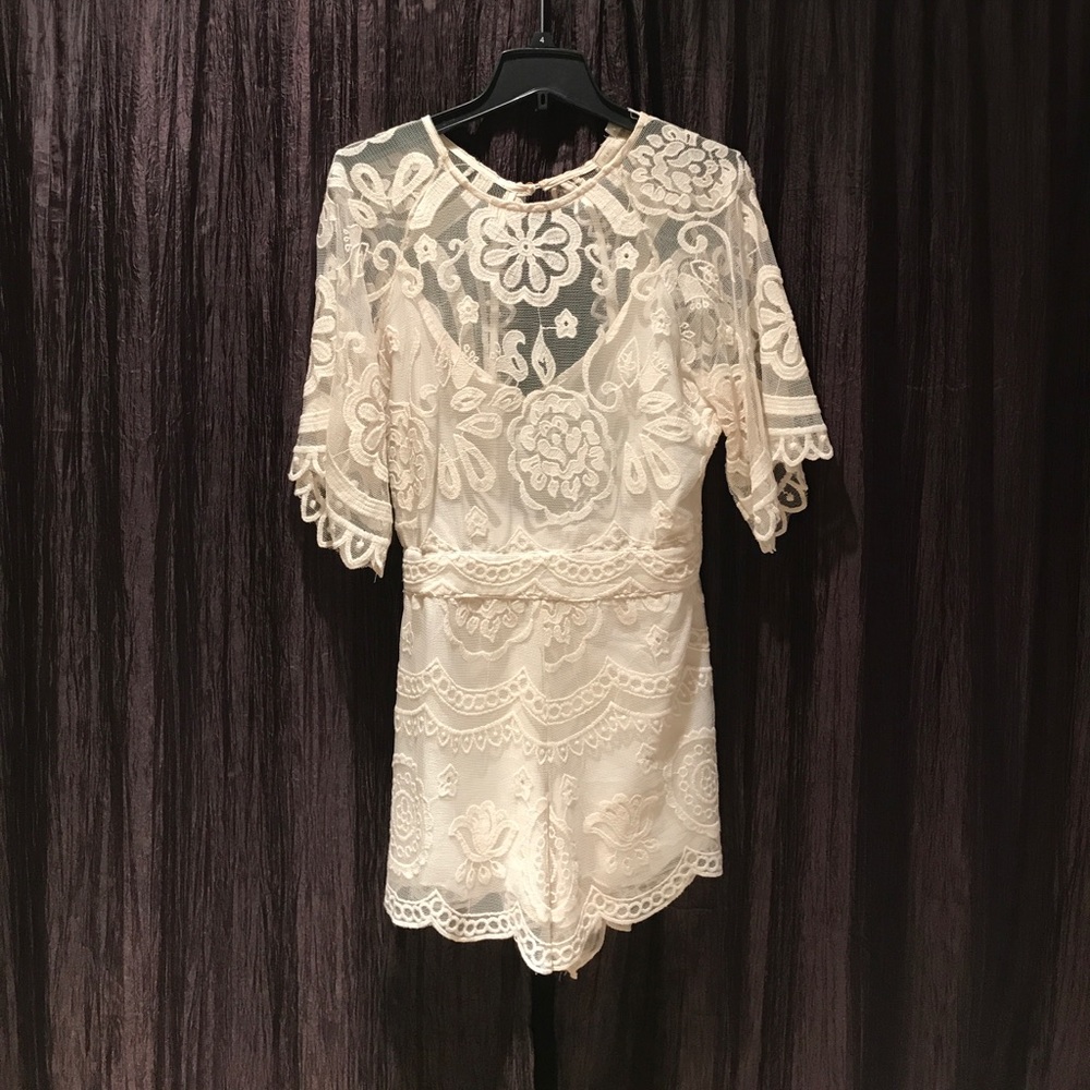 Never been worn white romper, Jen's Pirate Booty!