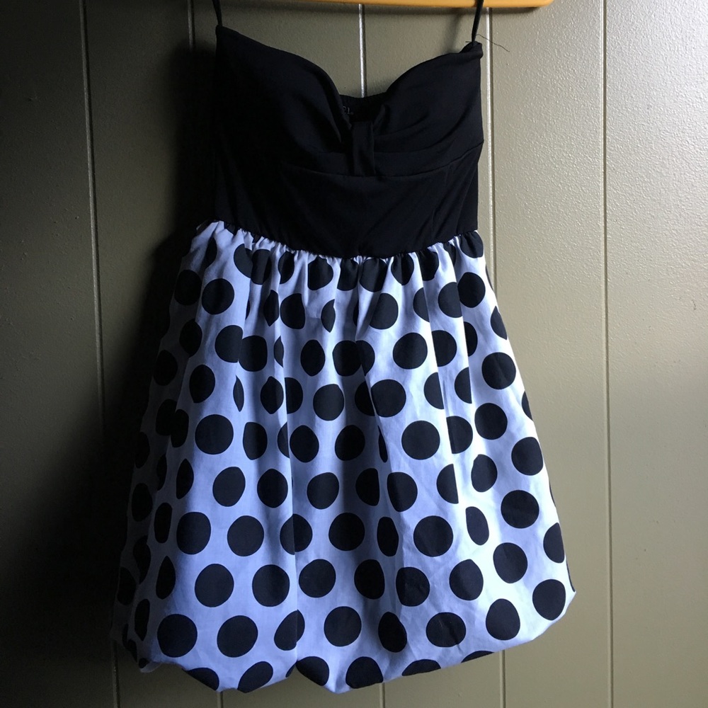 Black and polka dot strapless dress