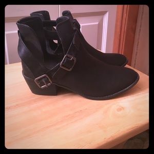 Black cut out booties.