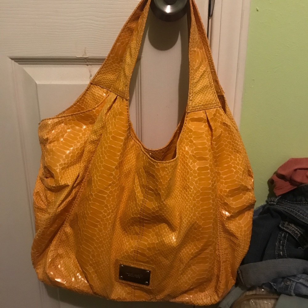 Yellow nine west purse