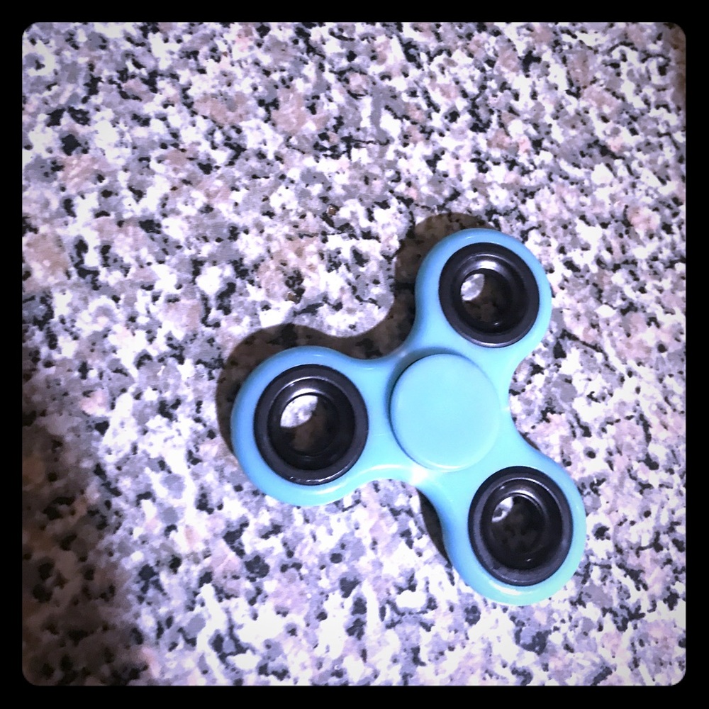 A slightly used baby blue fidget spinner💕