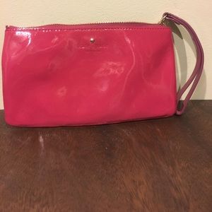 Pink Kate Spade patent leather wristlet