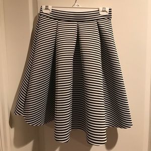 A black stripped skirt