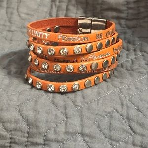 Leather strap bracelet.