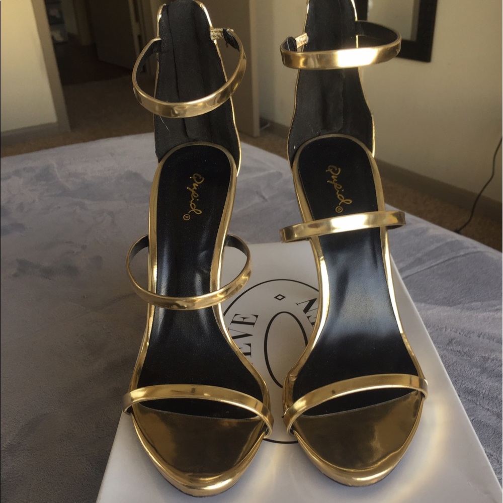 Gold strappy heels