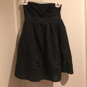 A strapless black dress