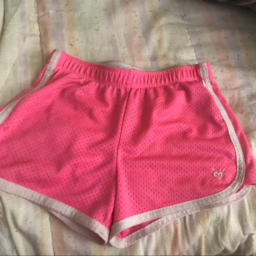 Bright pink shorts with white lining