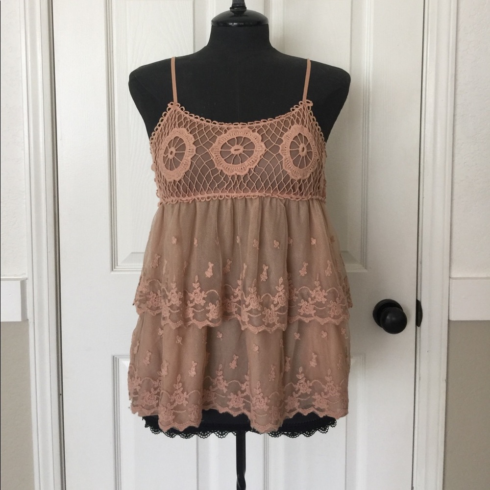 Adorable ruffle top with lace detail