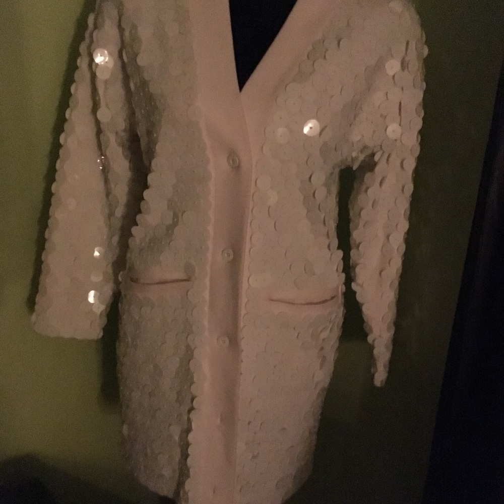 White Large sequined cotton and spandex jacket.