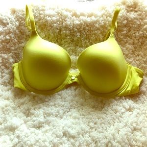 Bright yellow Victoria's Secret lined Demi bra.