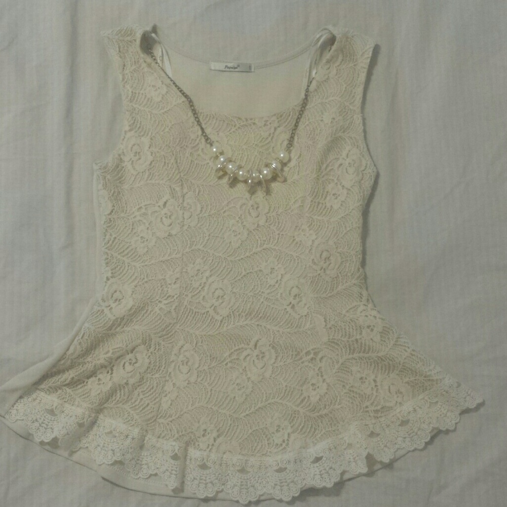 sleeveless casual/work blouse, creme colored