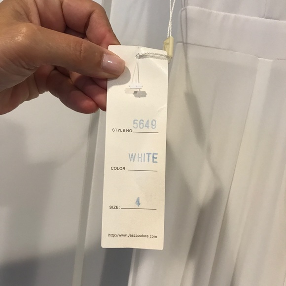 White evening gown with sheer mesh at v. - Picture 3 of 4