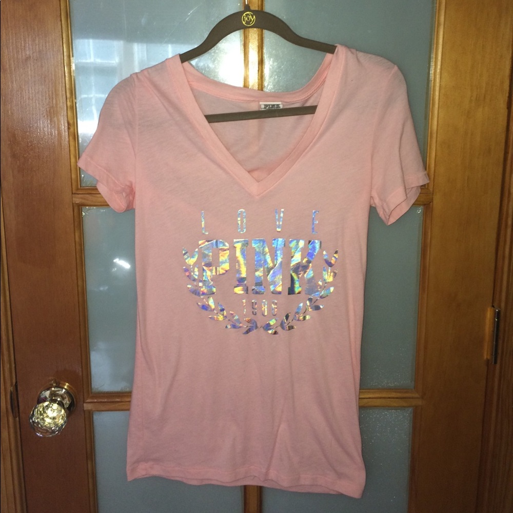 Pink v-neck with holographic lettering