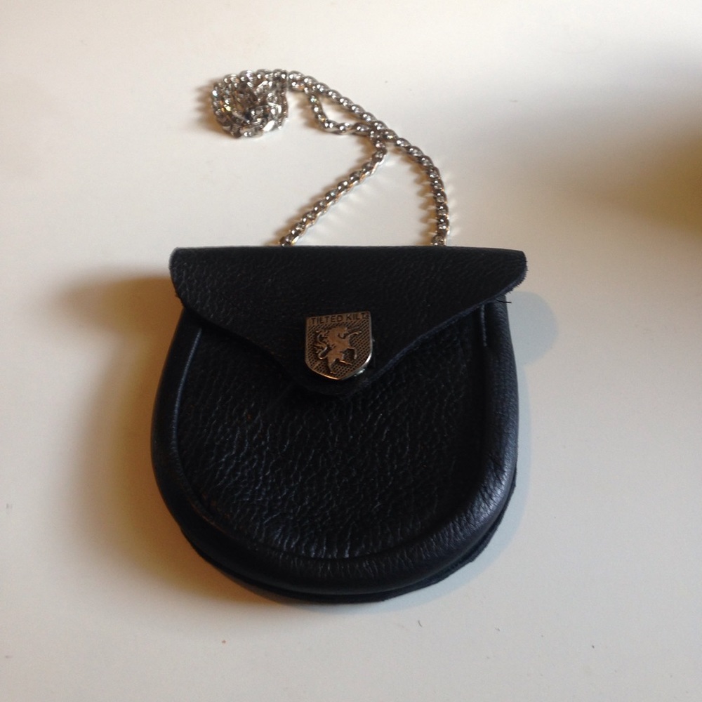 Tilted kilt cross body bag