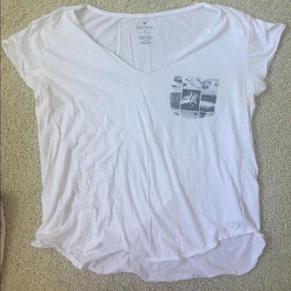 white tshirt with "LA" pocket