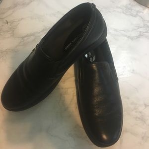 Michael Kors leather slip-ons.