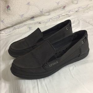 Gray crocs. Brand new. Didn't fit.