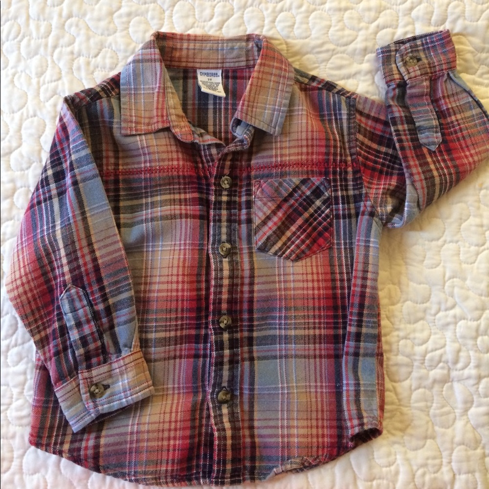 100% cotton button down shirt.