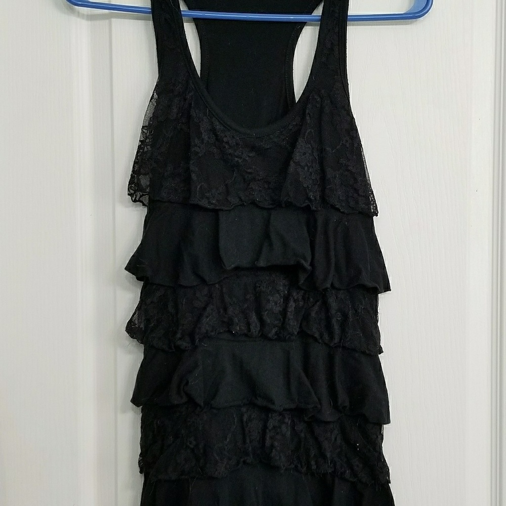 Ruffled black top