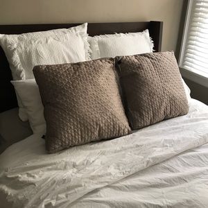 Taupe colored matching throw pillows