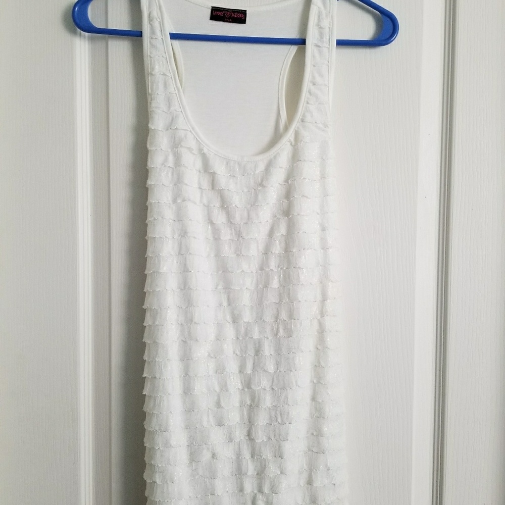 White ruffled top