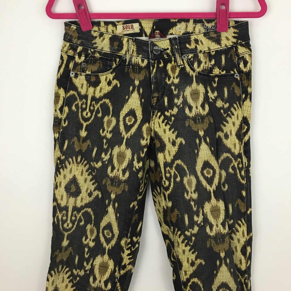 Awesome patterned jeans.