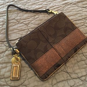 Coach brown wristlet
