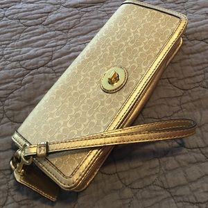 Coach gold clutch