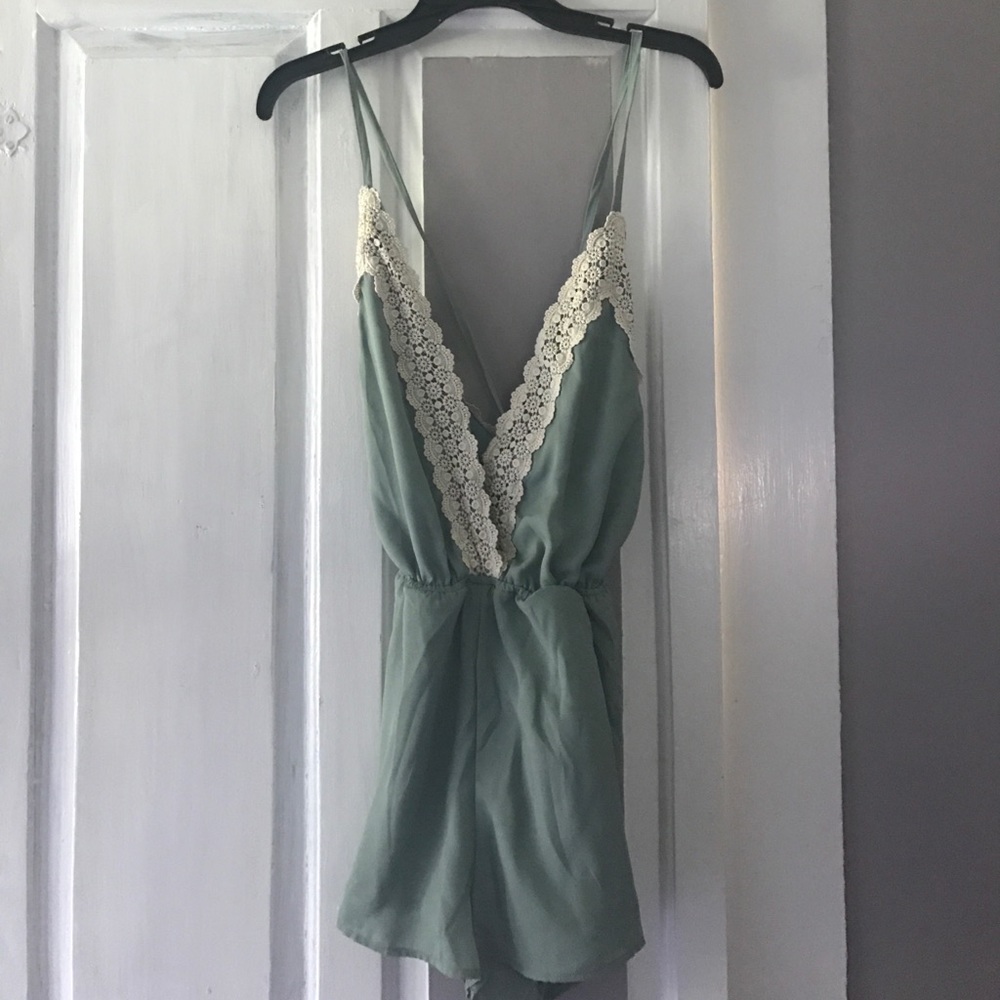 Mint green lace criss-cross back romper
