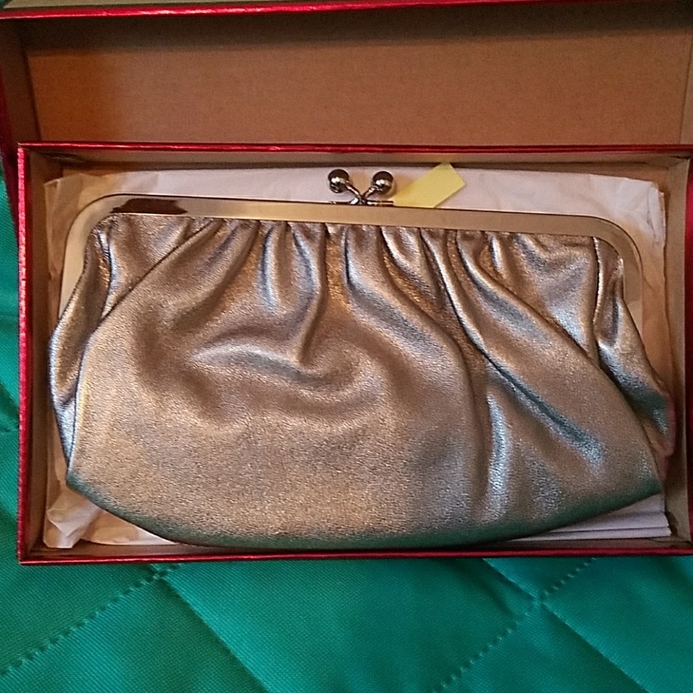 New in box silver clutch bag