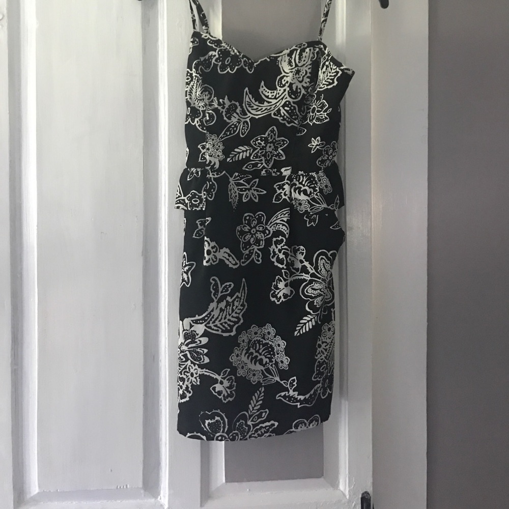 Black and white peplum style dress
