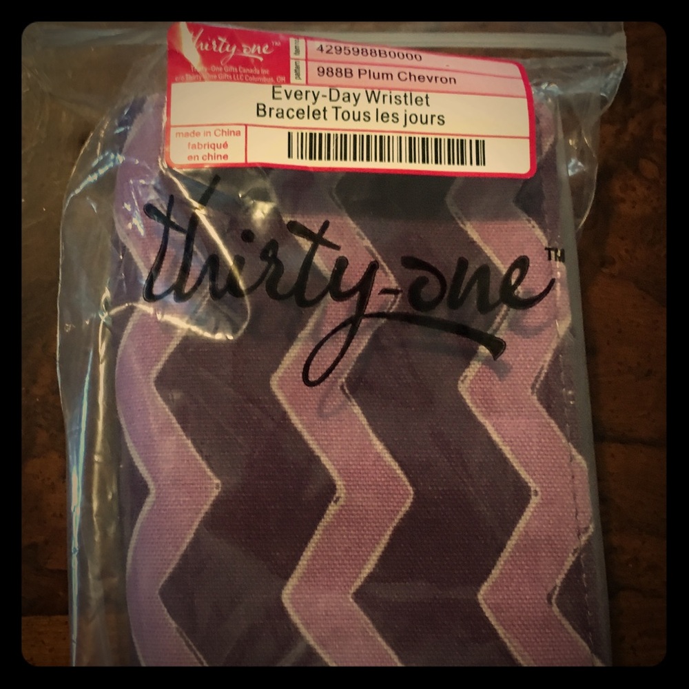 thirty-one wristlet in Plum Cheveron