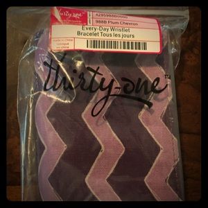 thirty-one wristlet in Plum Cheveron