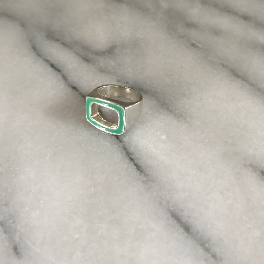 Silver ring with turquoise enamel.
