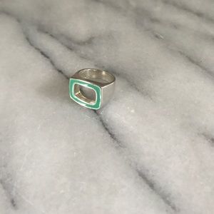 Silver ring with turquoise enamel.