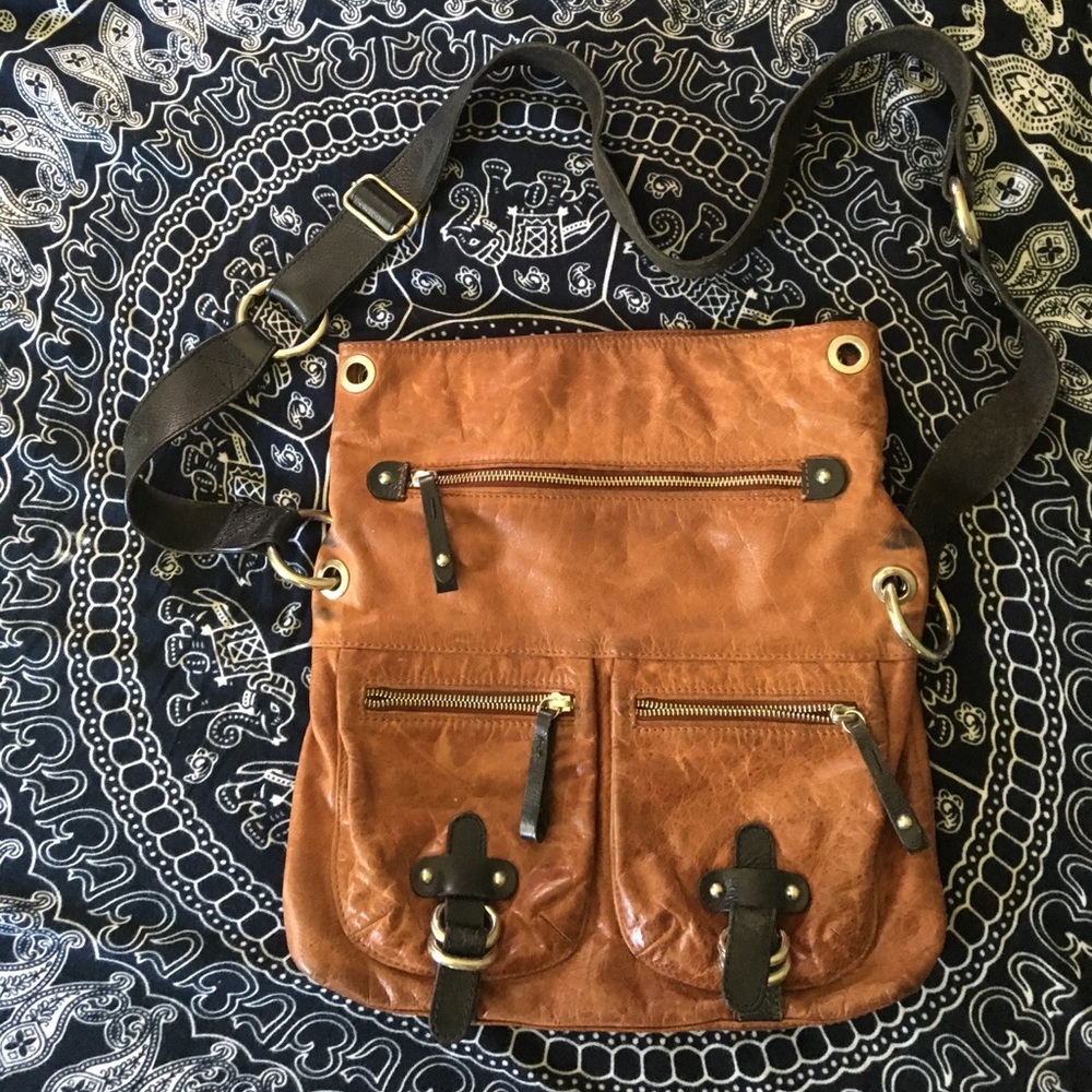 Brown and leather messenger bag
